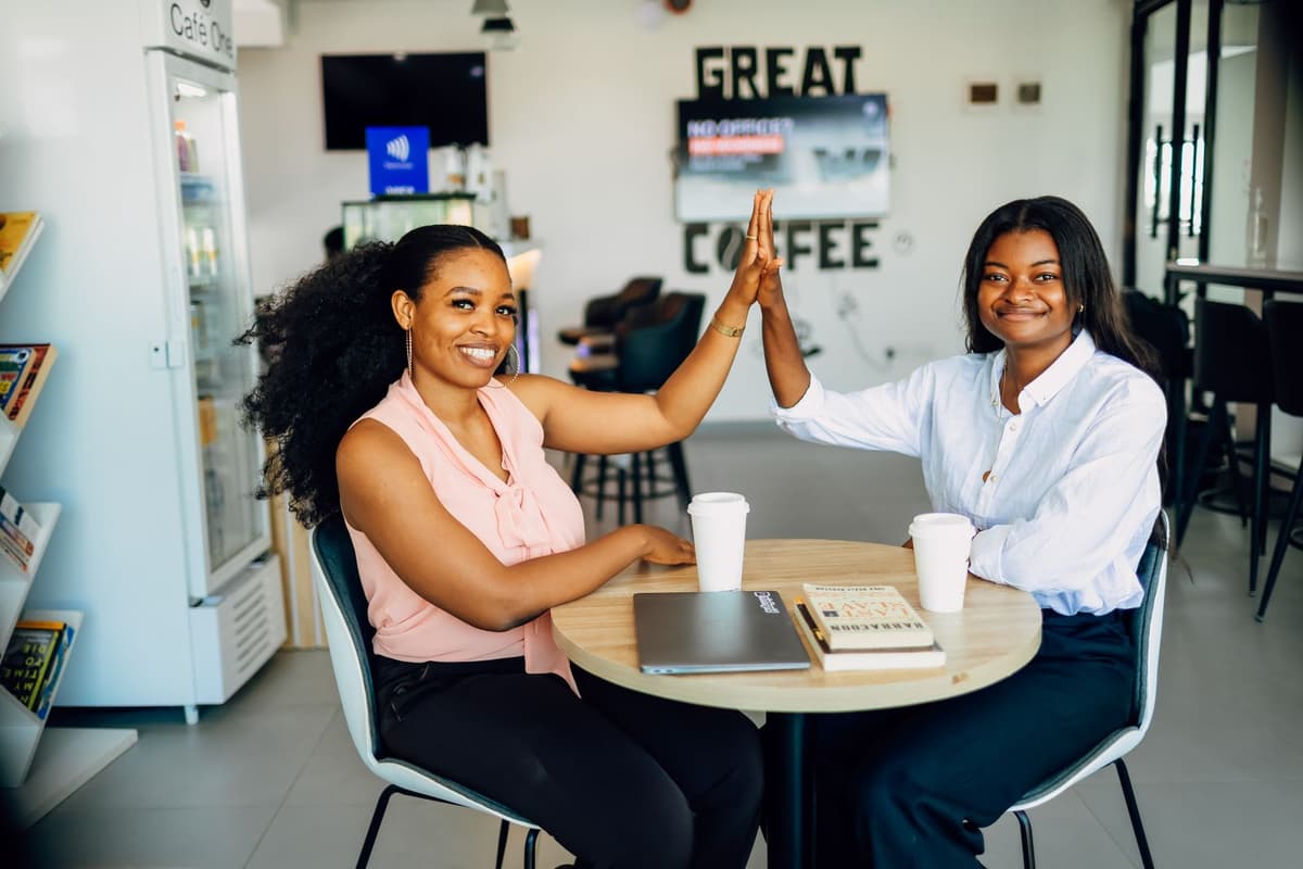 Two partners celebrating a new collaboration